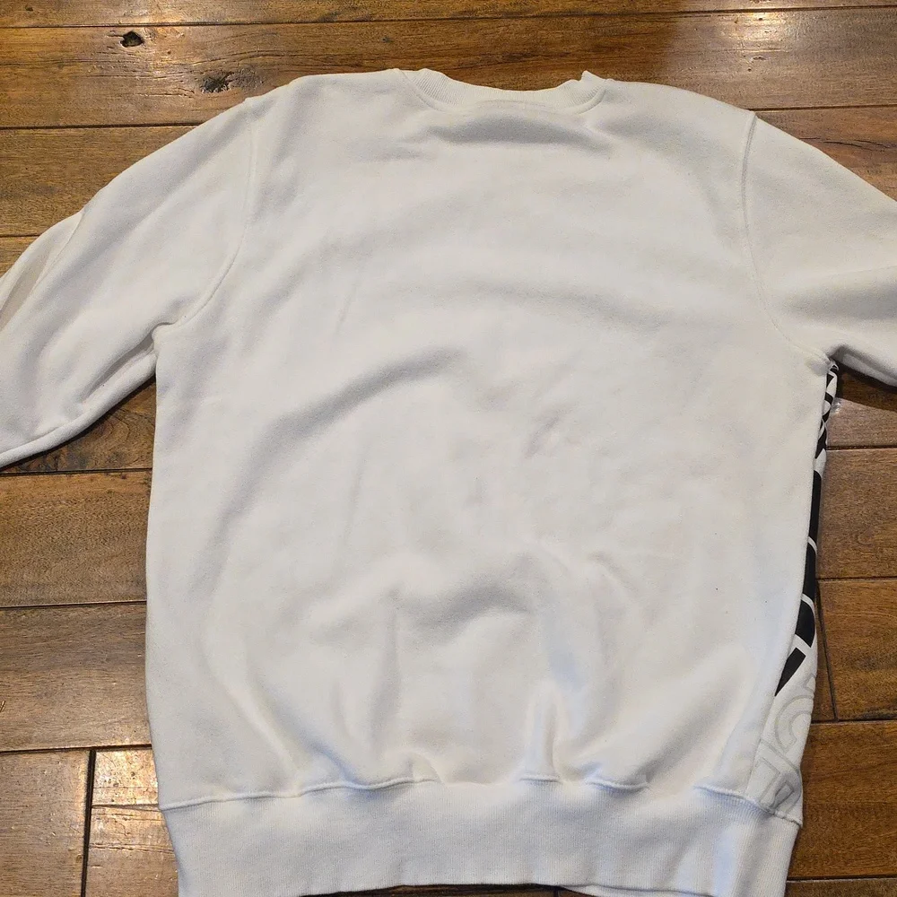 The North Face Men's White and Black All Over‎ Graphic Sweatshirt M